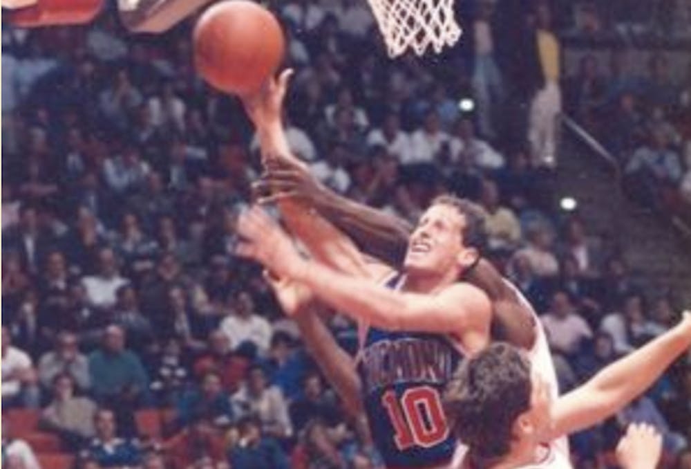 Kenny Atkinson, '90, is celebrated as one of the University of Richmond's most accomplished men's basketball alum. Courtesy of Richmond Athletics. 