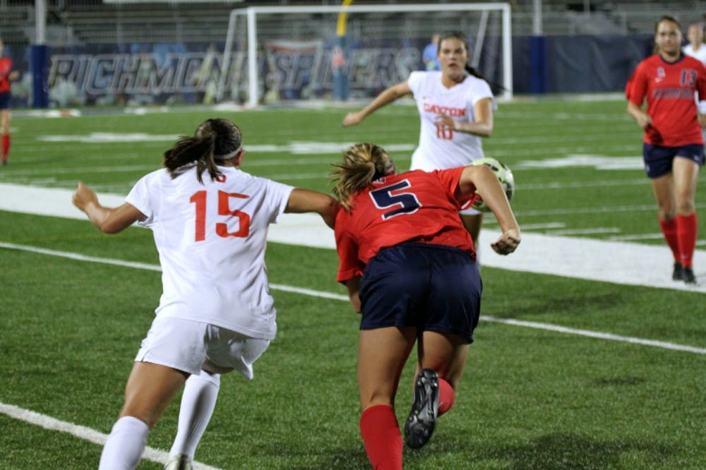 <p>Richmond forward and athlete of the week Meaghan Carrigan fights for possession.</p>