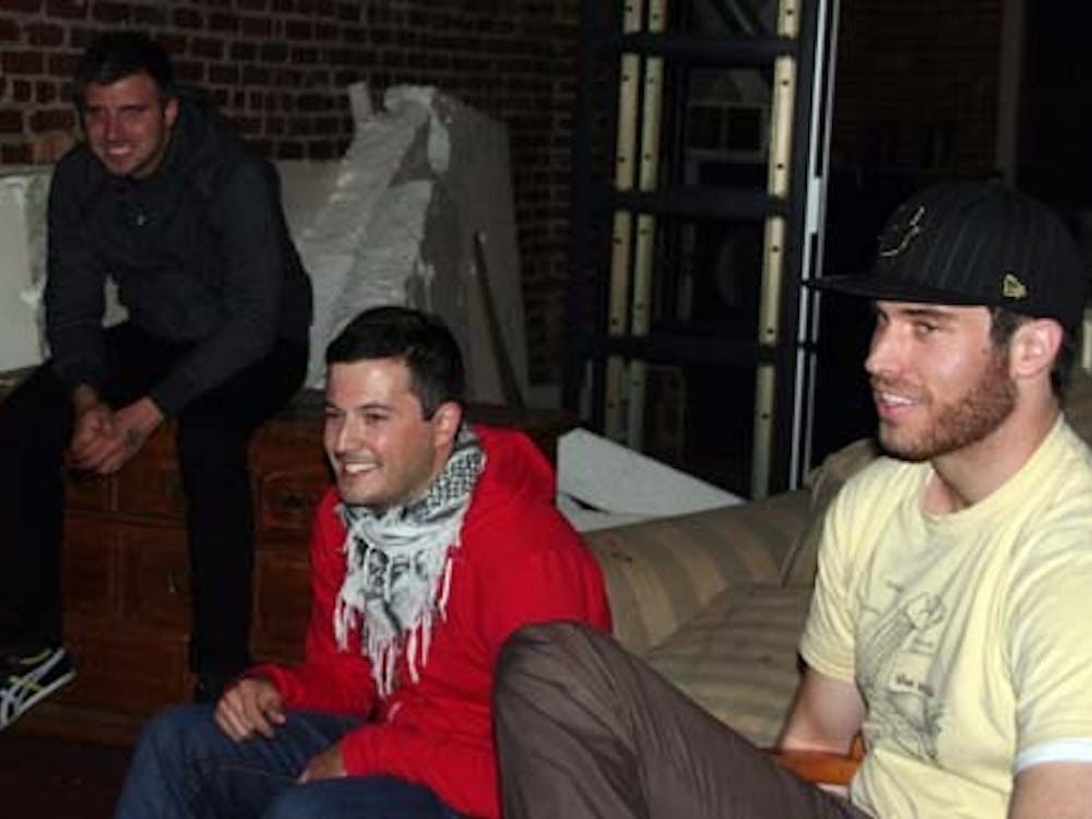 Band members of Barcelona; Chris Bristol, guitar; Brian Fennell, lead singer and keyboard; and Rhett Stonelake, drums, relax at Alley Katz before their performance