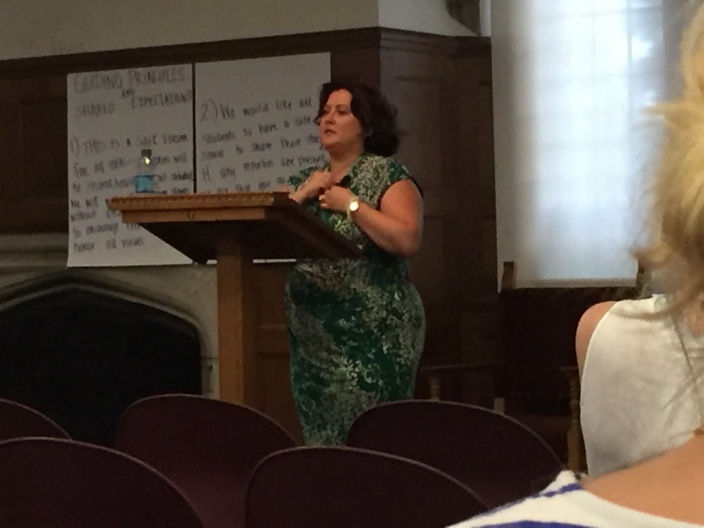 <p>Dean Genoni leads discussion at Westhampton "Call for Change" forum, which aimed to find ways to move forward after sexual assault controversy.</p>