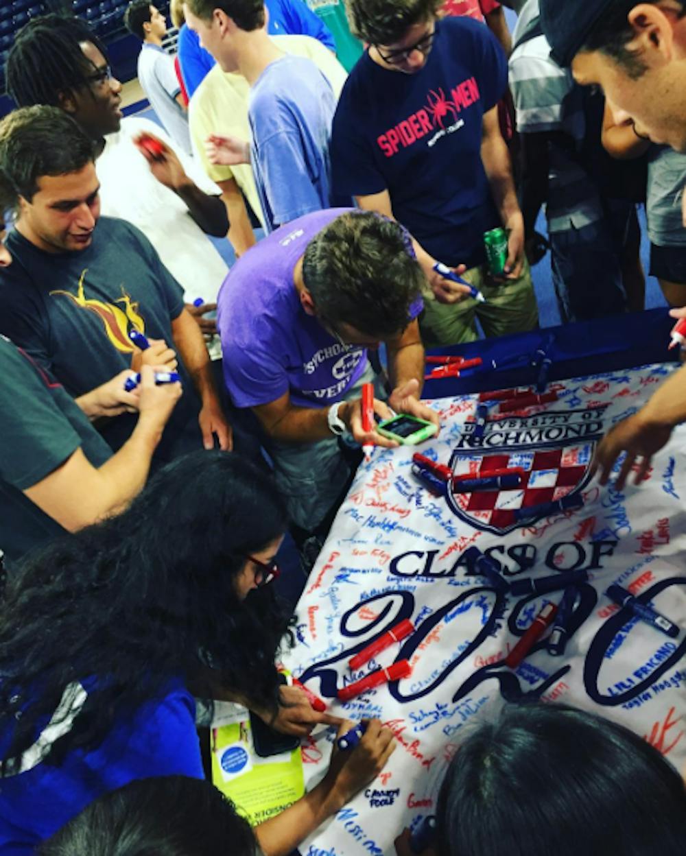 <p>The freshmen class signs their 2020 banner during orientation.</p><p>Photo courtesy of Instagram/University of Richmond</p>