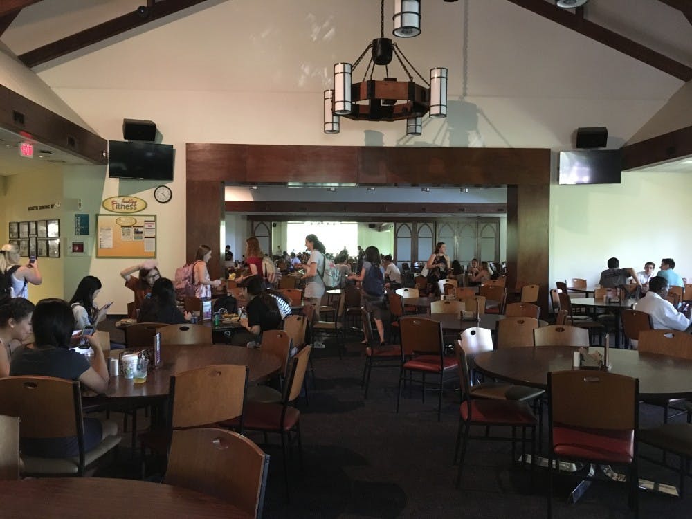 <p>Heilman Dining Center, one of the buildings affected by a power outage on campus, is pictured dark and without air conditioning on Wednesday.</p>