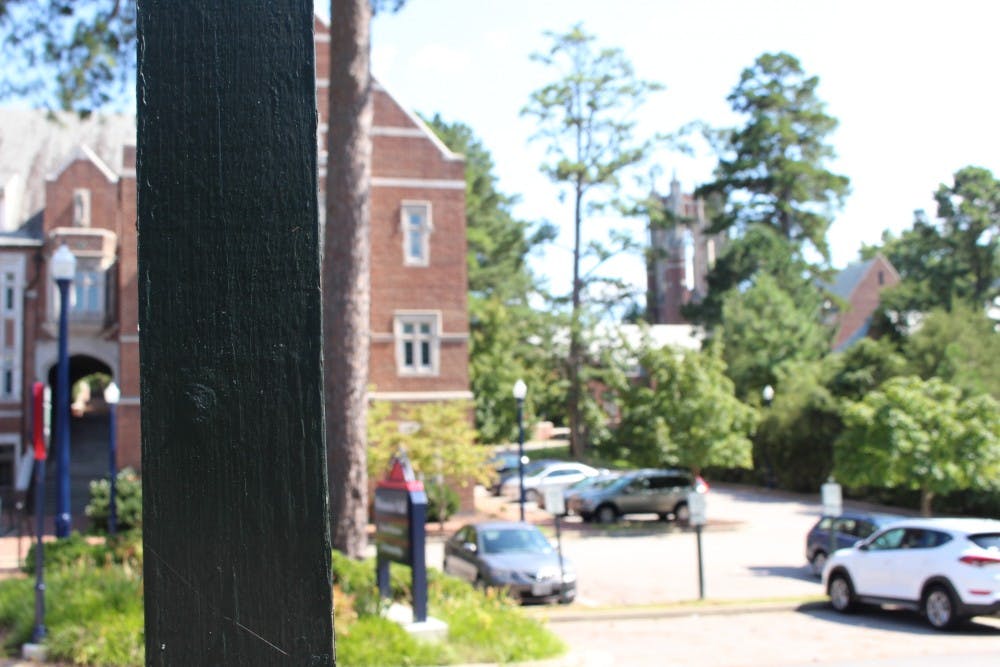 According to images on Twitter, a white supremacist group appeared to have placed one of the stickers on this wooden post, located near Weinstein Hall.&nbsp;