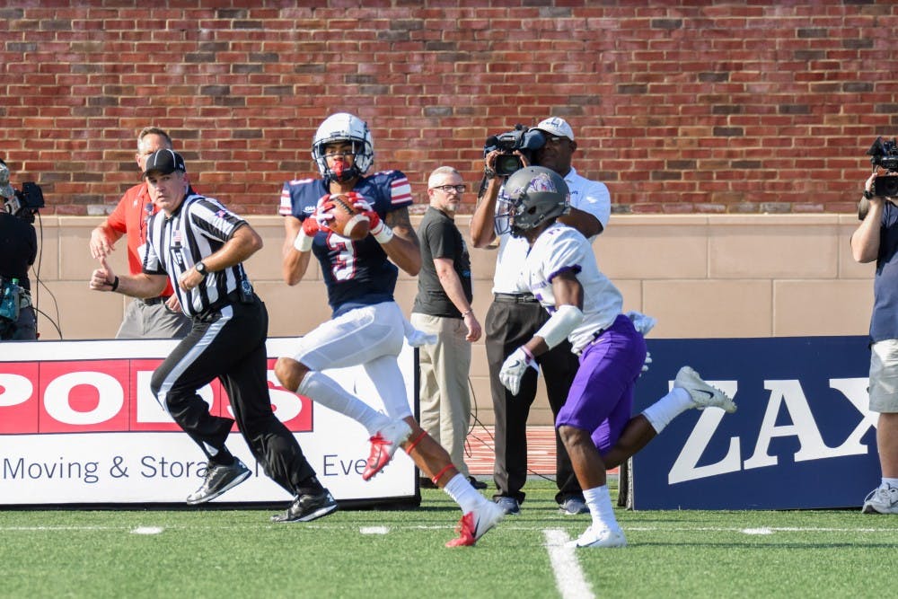 <p>Redshirt senior wide receiver Jarmal Bevels catches a pass Saturday against James Madison University. Bevels had one reception for 50 yards in a Spiders loss.&nbsp;</p>