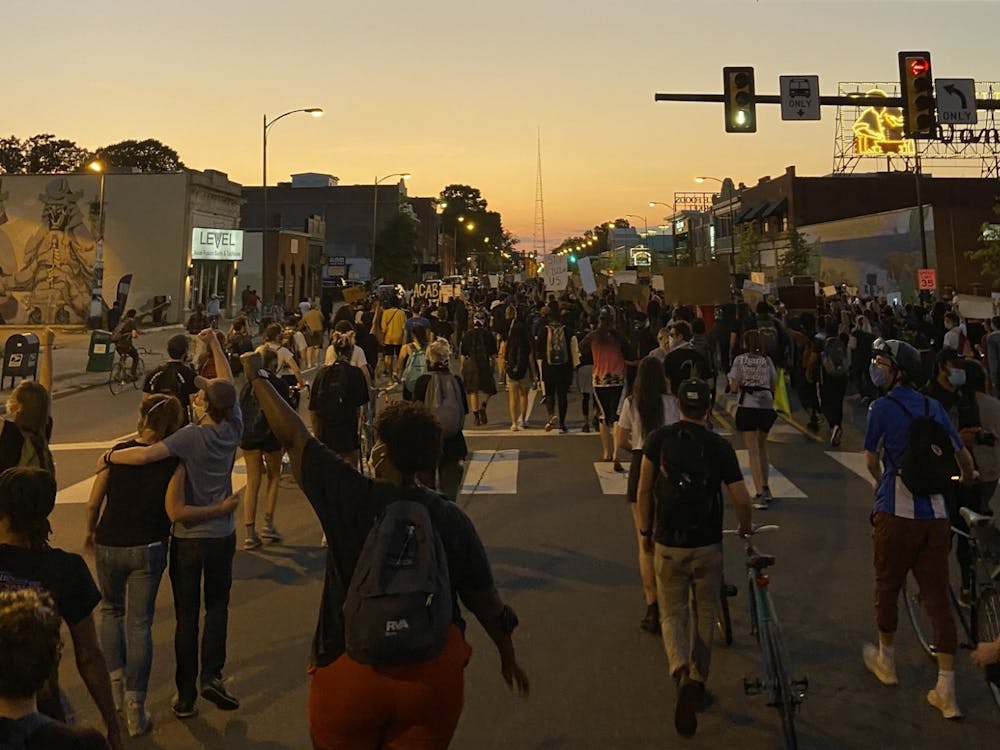 Protesters march down W. Broad Street at 9 p.m. on June 2.&nbsp;