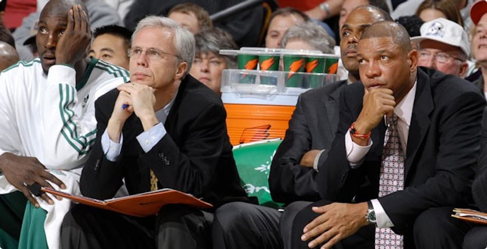 <p>Kevin Eastman (second from the&nbsp;left) on the&nbsp;Celtics bench. <em>Photo courtesy of the University of Richmond Newsroom.</em></p>