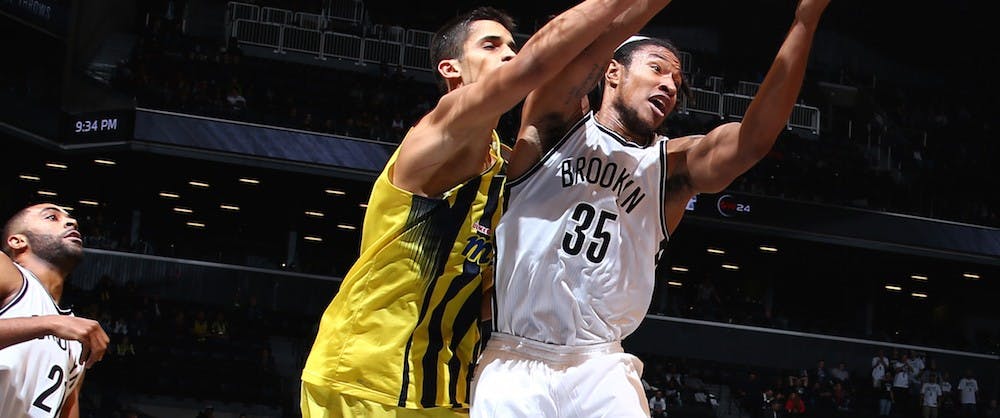 BROOKLYN, NY - OCTOBER 5:  Justin Harper #35 of the Brooklyn Nets grabs the rebound against Fenerbahce Ulker during a preseason game on October 5, 2015 at Barclays Center in Brooklyn, New York. NOTE TO USER: User expressly acknowledges and agrees that, by downloading and or using this Photograph, user is consenting to the terms and conditions of the Getty Images License Agreement. Mandatory Copyright Notice: Copyright 2015 NBAE (Photo by Nathaniel S. Butler/NBAE via Getty Images)