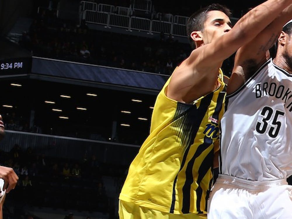 BROOKLYN, NY - OCTOBER 5:  Justin Harper #35 of the Brooklyn Nets grabs the rebound against Fenerbahce Ulker during a preseason game on October 5, 2015 at Barclays Center in Brooklyn, New York. NOTE TO USER: User expressly acknowledges and agrees that, by downloading and or using this Photograph, user is consenting to the terms and conditions of the Getty Images License Agreement. Mandatory Copyright Notice: Copyright 2015 NBAE (Photo by Nathaniel S. Butler/NBAE via Getty Images)