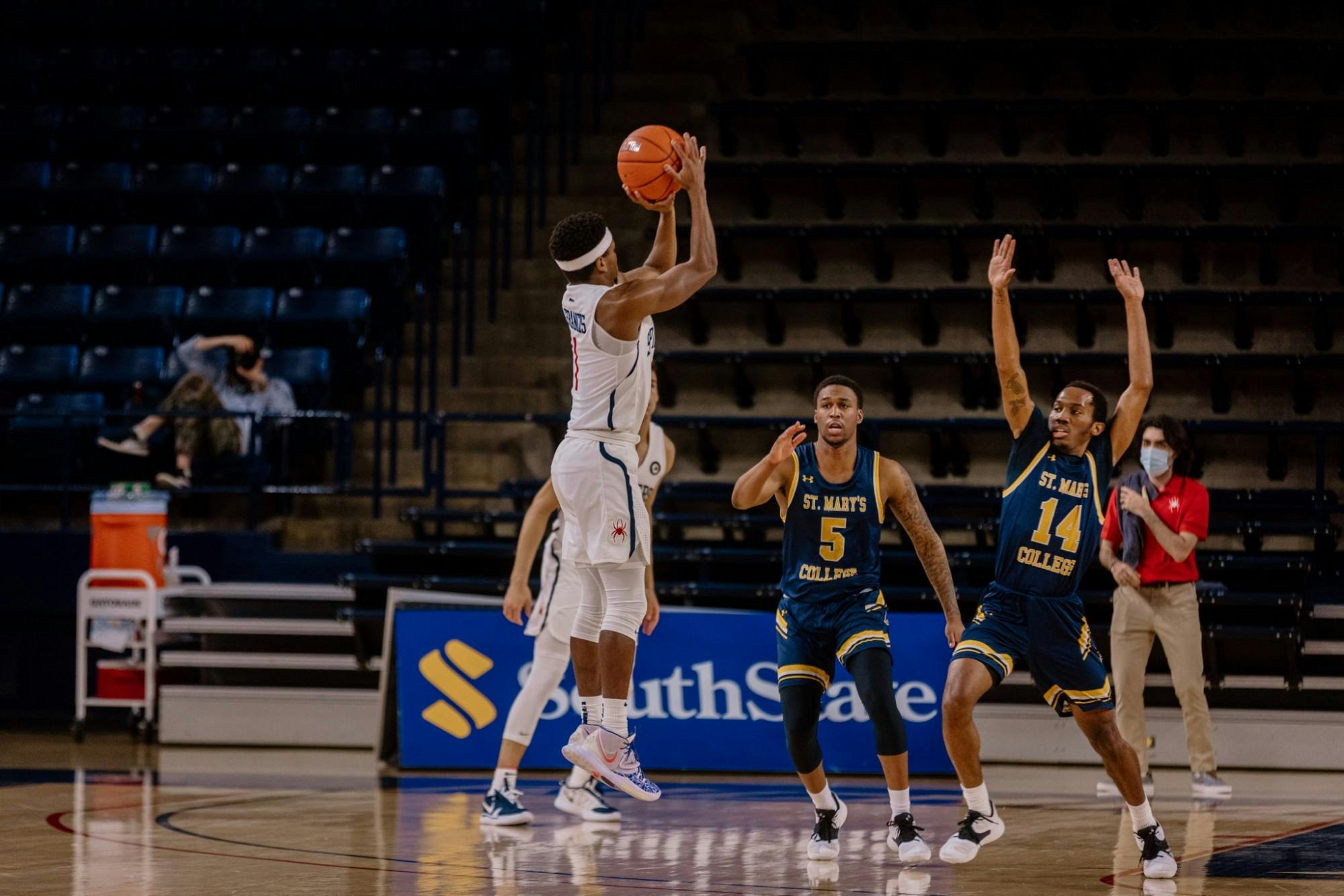 Graduate Student forward Blake Francis takes a shot over a defender during a game against St. Mary's College on February 14th. Photo courtesy of Richmond Athletics