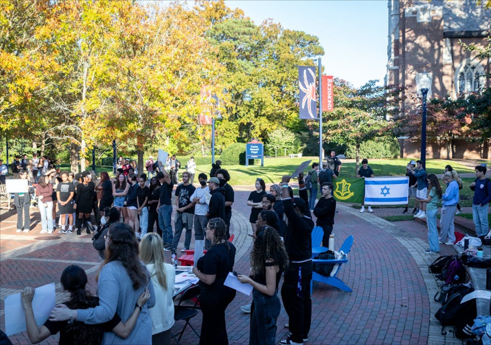 <p>Spiders Against Apartheid demonstration takes place Oct. 25 with counter-protesters and University of Richmond Police Department standing outside the demonstration. &nbsp;</p>