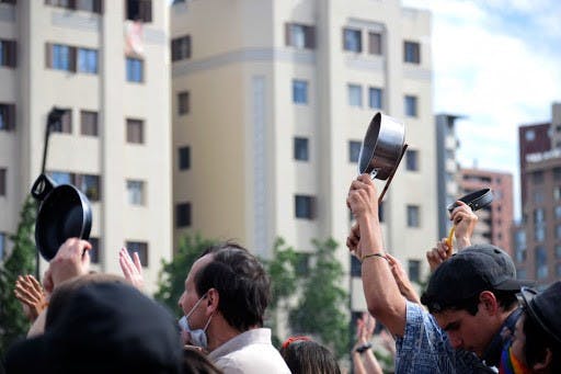 Protestors in Santiago, Chile hit pots and pans in a common form of protest called “cacerolazo.”