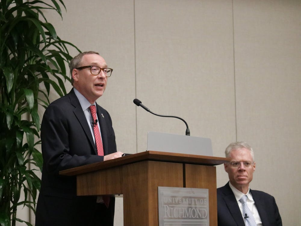 President Kevin Hallock introduces panelists at "The Future of Higher Education" event during inauguration on April 8 in the Queally Center for Admission and Career Services.