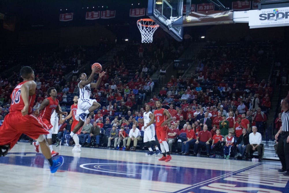 Kendall Anthony lays the ball in during the final minutes of Wednesday's game. He scored six points in the final three minutes to lead Richmond to a victory. 
