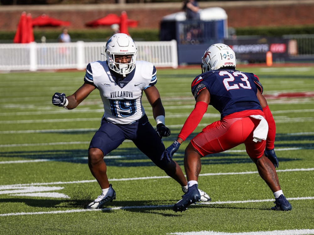 Sophomore defensive back Angelo Rankin guards a Villanova University player at the Oct. 15 game in the Robins Stadium.