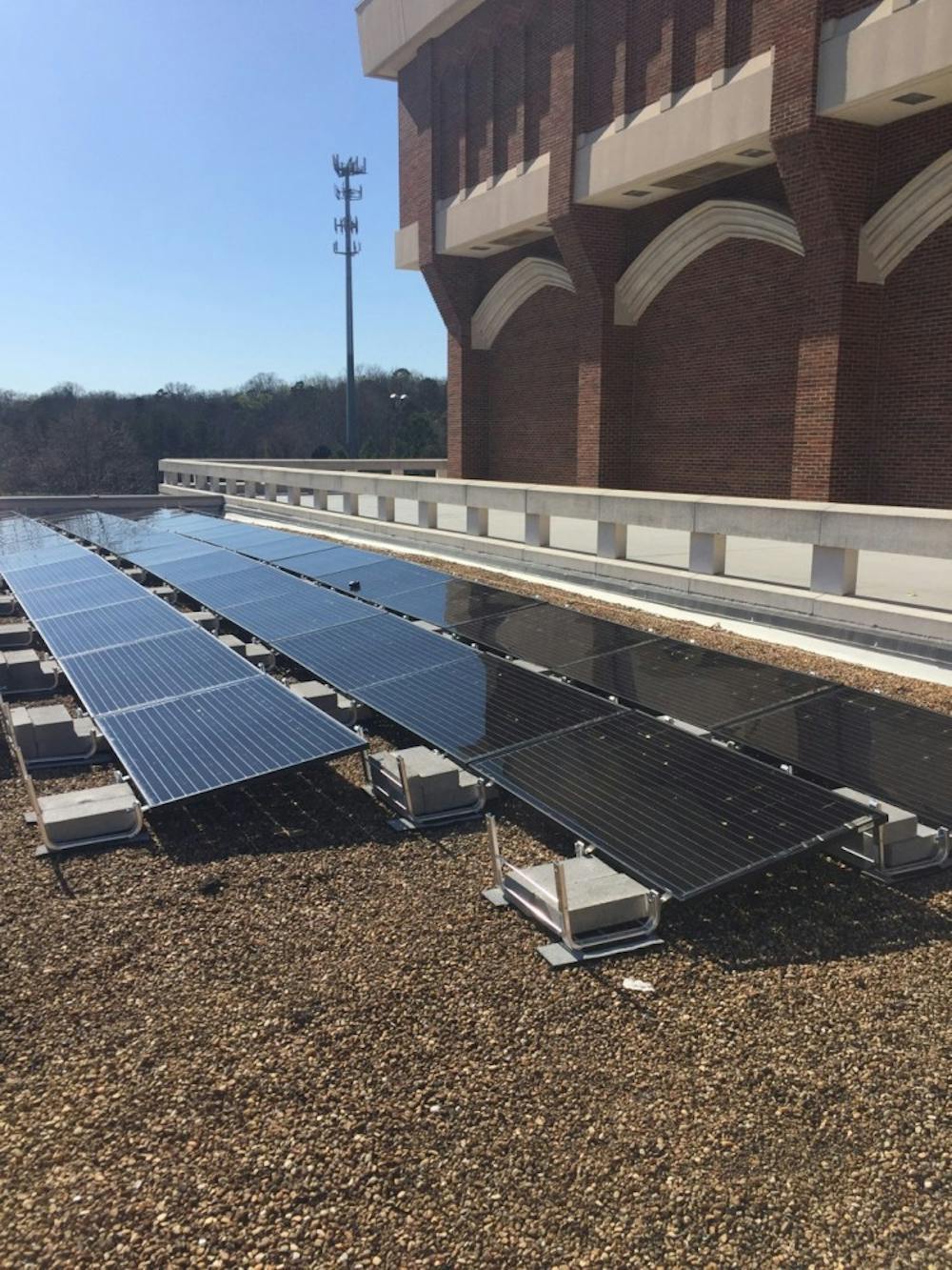 Solar panels on top of the Weinstein Center will finish being installed by the end of March. Photos by Ashlee Korlach.