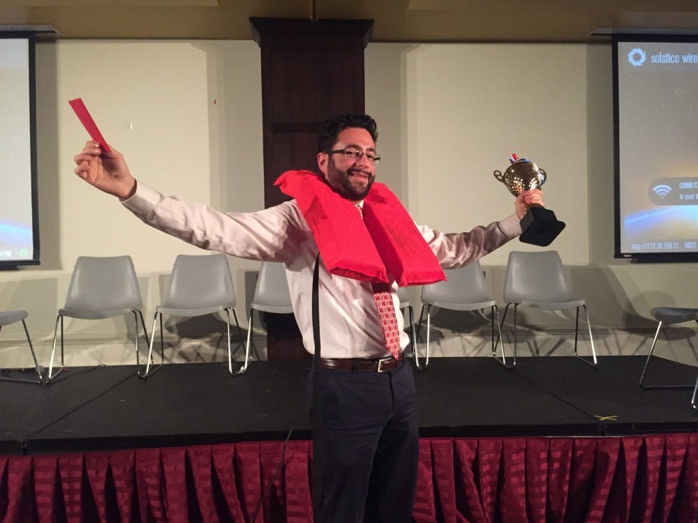 Department of physics’ Jack Singal is crowned the champion at UR’S first professor life raft debate.&nbsp;