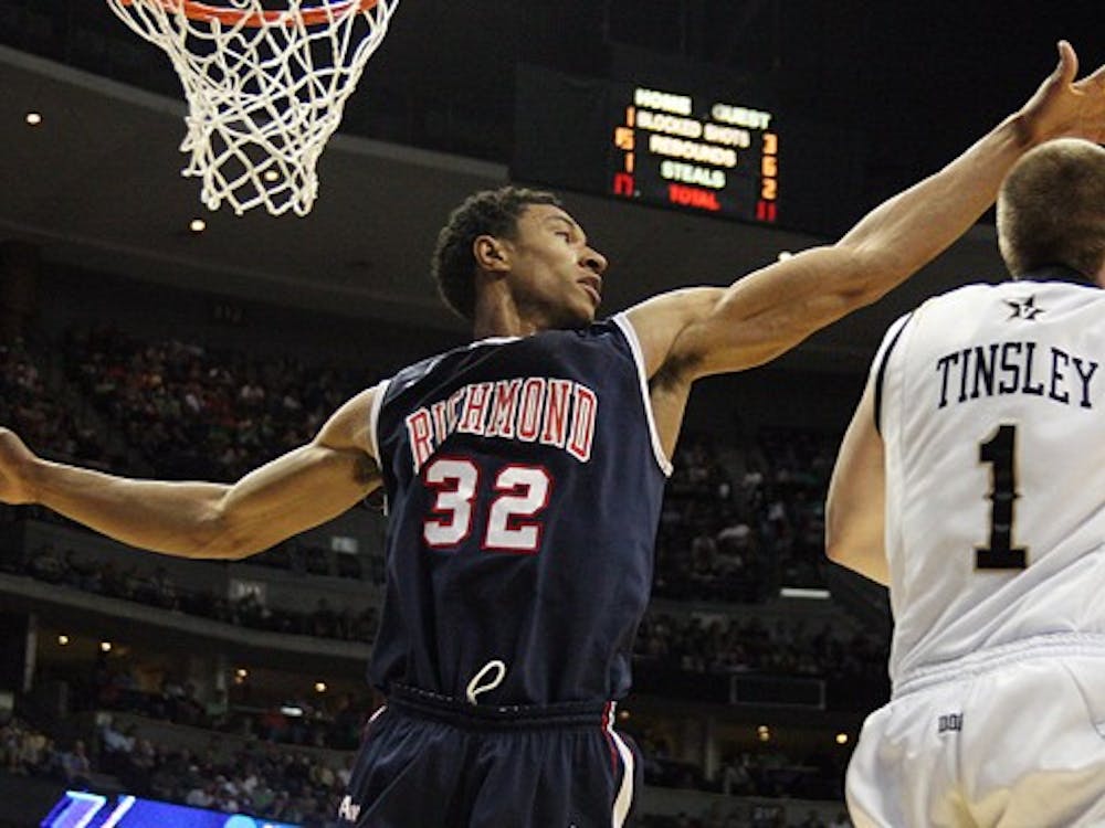 University of Richmond senior Justin Harper goes to block a shot during the second-round NCAA men's basketball tournament game at Pepsi Center in Denver on Thursday, March 17, 2011. (Anna Kuta/The Collegian)