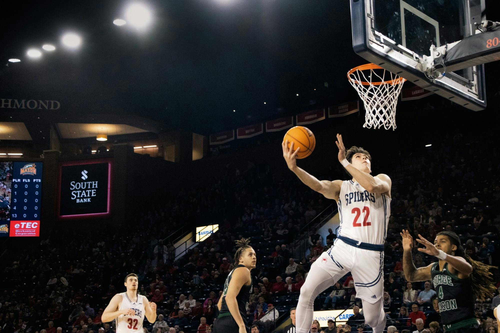 Andre Gustavson's layup in game against George Mason, Saturday.