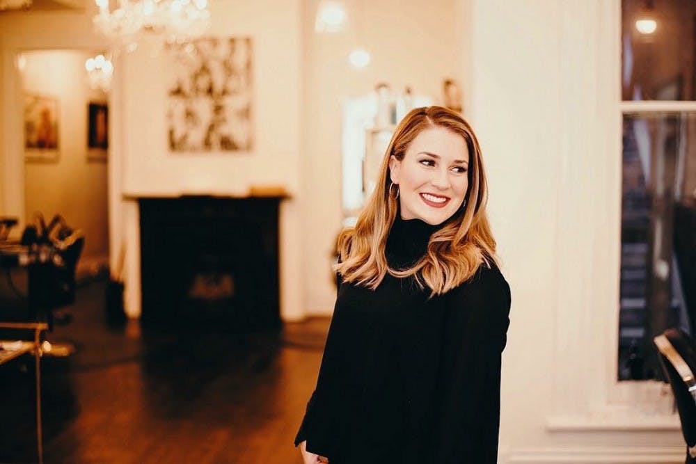 Senior Sarah Hipwell in Avenue 42 salon, one of her marketing clients. Photo courtesy of Woose + Willie Photography and Design.