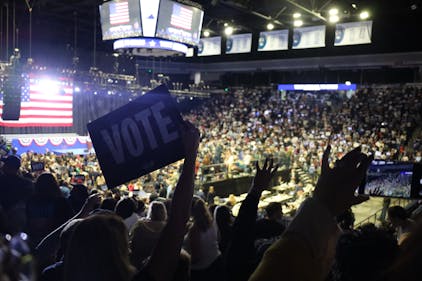 Vote sign Obama Spanberger rally 2025