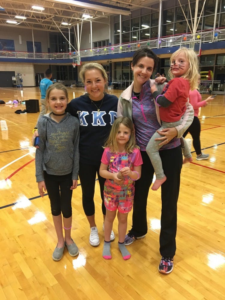 Ellie Masson, WC '18, with her&nbsp;cousin&nbsp;Sylvia Donovan and Donovan's three children at the Relay for Life event.