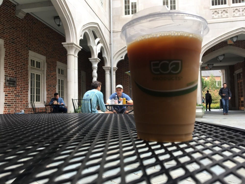 A strawless cold-drink plastic cup from Passport Cafe.&nbsp;