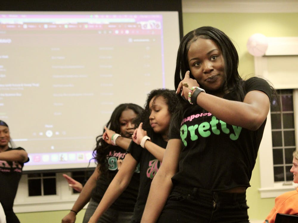 Members of the Rho Mu Chapter of the Alpha Kappa Alpha Sorority Inc. stroll at their philanthropy event on April 7 to raise funds for breast cancer awareness.&nbsp;