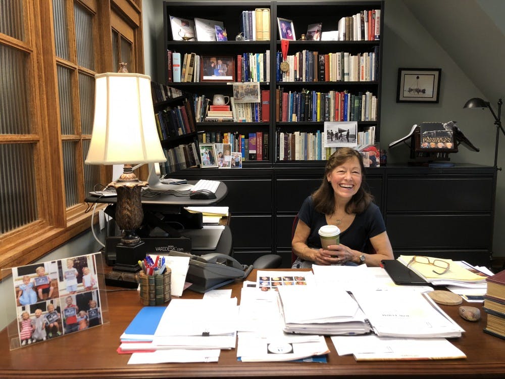 Professor Linda Hobgood sits in her office at the Speech Center on the fourth floor of Weinstein Hall.&nbsp;