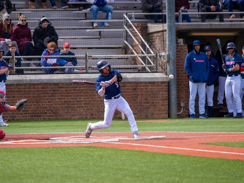 Graduate outfielder Christian Beal swing the bat at the Feb. 26 game against Sacred Heart University.