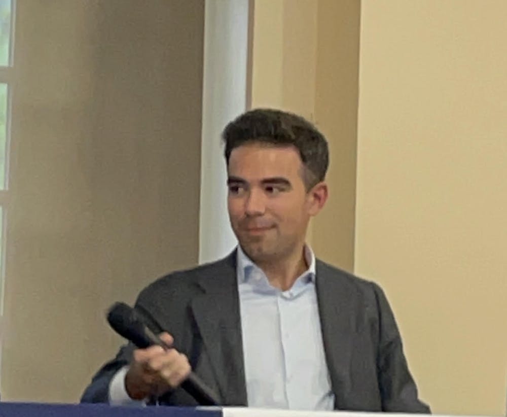 Anthony Polcari, '21, speaking at a panel while visiting the University of Richmond in September 2024.