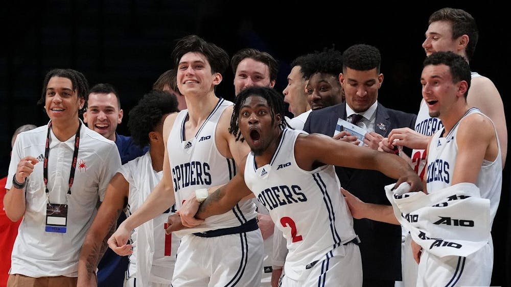 <p>Spiders celebrate the win against UMass at the Atlantic 10 Men’s Basketball Tournament on March 7. Photo courtesy of Richmond Athletics.&nbsp;</p>