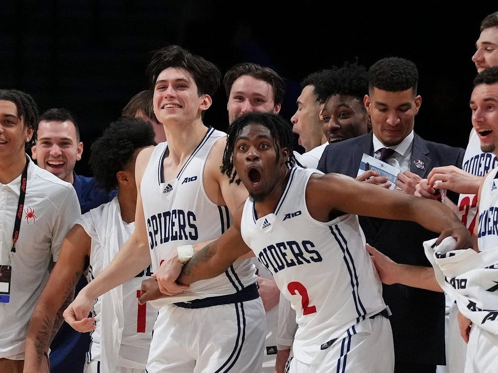 Spiders celebrate the win against UMass at the Atlantic 10 Men’s Basketball Tournament on March 7. Photo courtesy of Richmond Athletics.&nbsp;