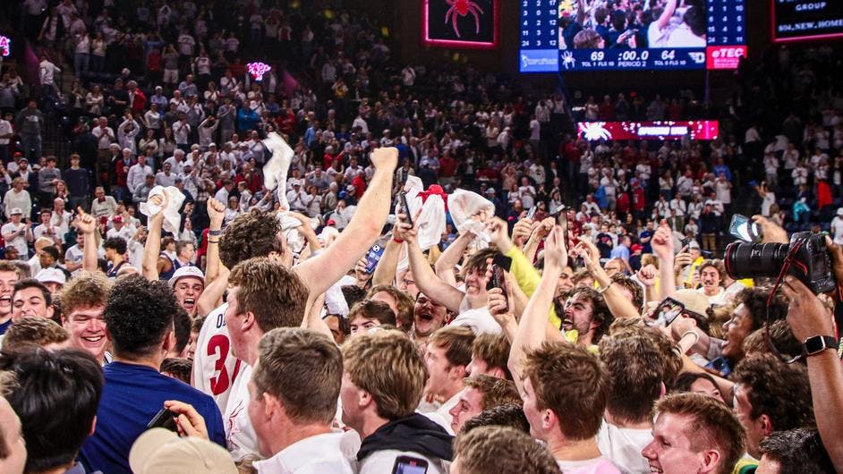 Celebration at the Robins Center following the Spiders' 69-64 victory over Dayton University on Jan. 27. Courtesy of Richmond Athletics.