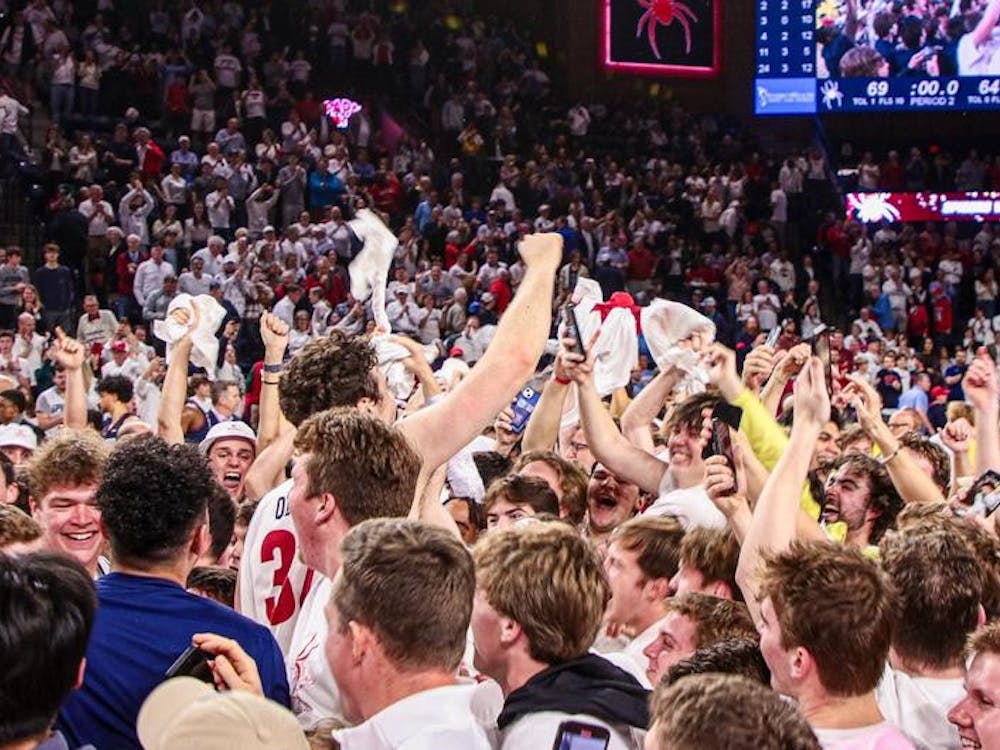 Celebration at the Robins Center following the Spiders' 69-64 victory over Dayton University on Jan. 27. Courtesy of Richmond Athletics.