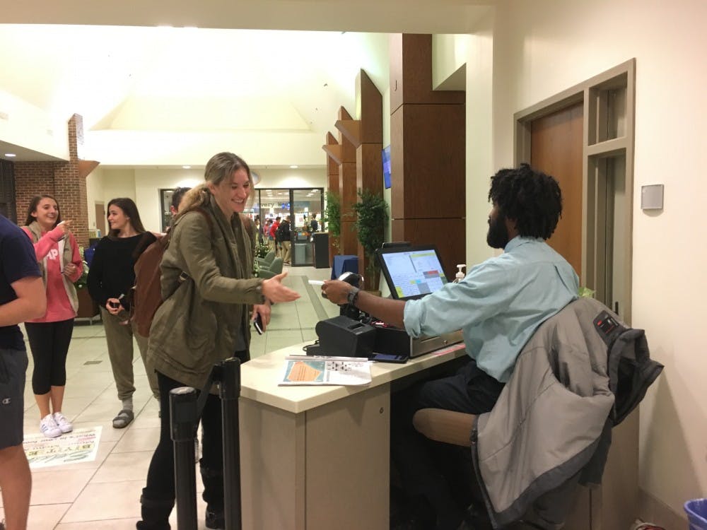 <div><p>Samantha Jaeger swipes into the Heilman Dining Center. Starting Nov. 15, students can donate one of their meal swipes to help fund a meal packaging event.</p></div>