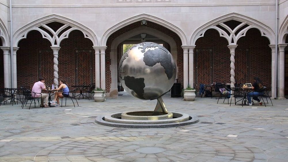 The courtyard of the Carole Weinstein International Center, where Passport Café is located.