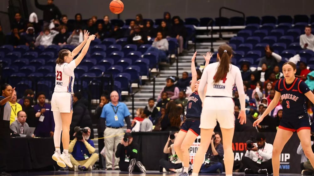 Graduate guard Alyssa Jimenez shoots for a basket at the Atlantic 10 tournament. Courtesy of Richmond Athletics