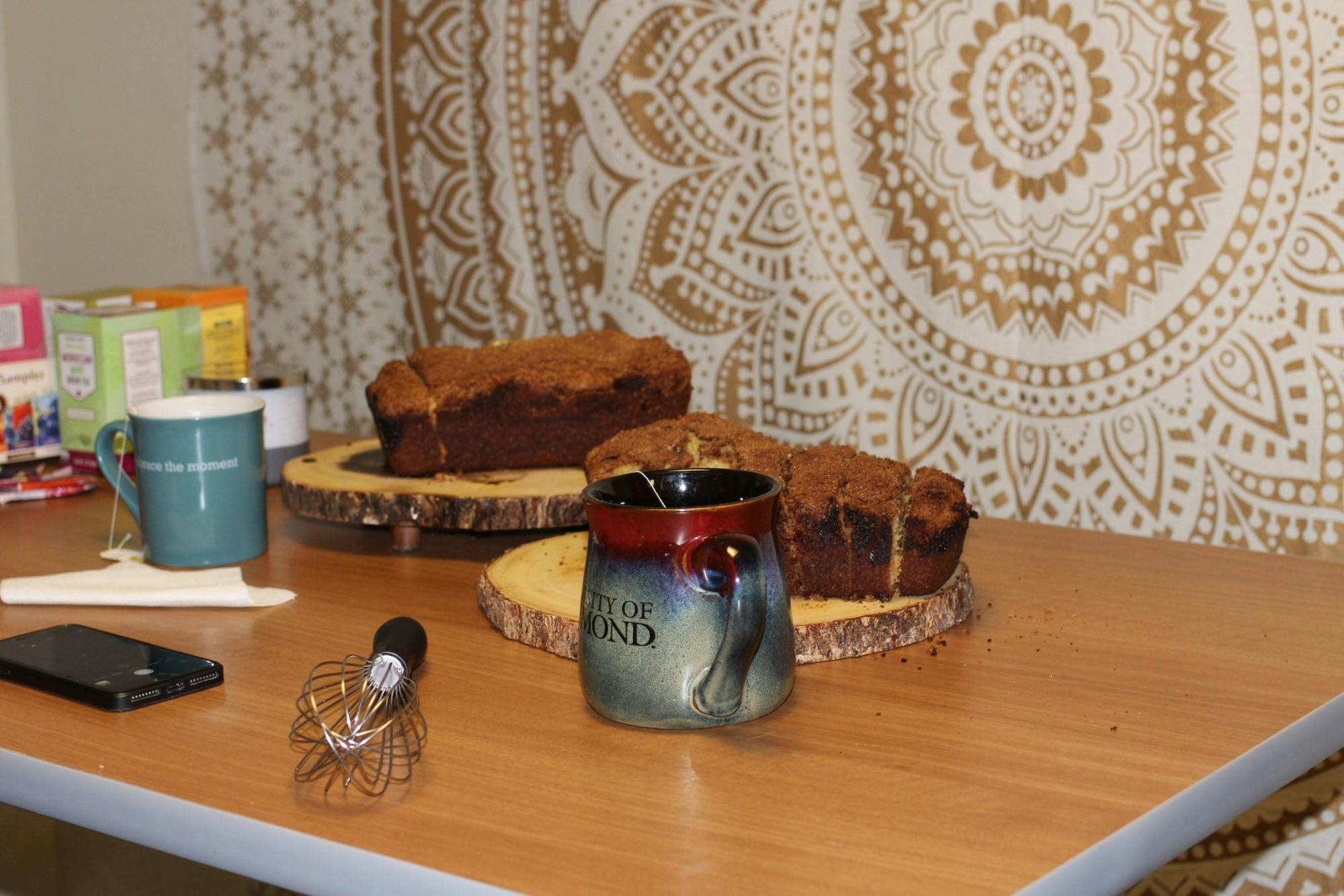 Freshly baked bread and mugs full of hot tea are on display at one of senior Callie Cinque's popular Tea &amp; Bread nights.&nbsp;