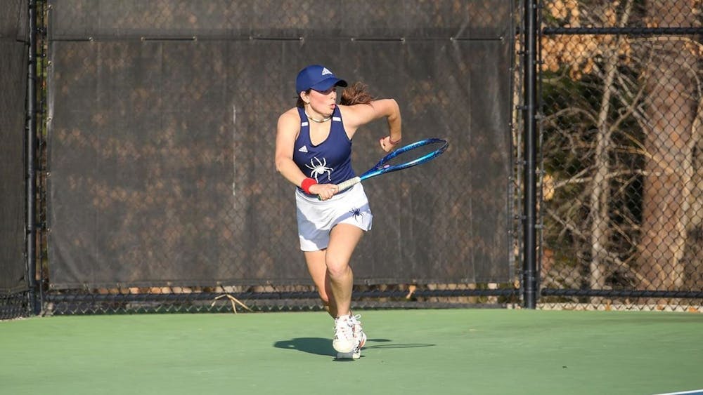 <p>Junior Marta Buendia runs at the March 25 matches against George Mason University at the Westhampton Tennis Courts, where went undefeated. Photo courtesy of Richmond Athletics.&nbsp;</p>
