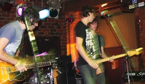 Anthony Polcino, guitar and vocals, lead singer and guitarist Lucas Field, and Jon Pancoast, bass, of Low vs Diamond perform at Alley Katz in Richmond.