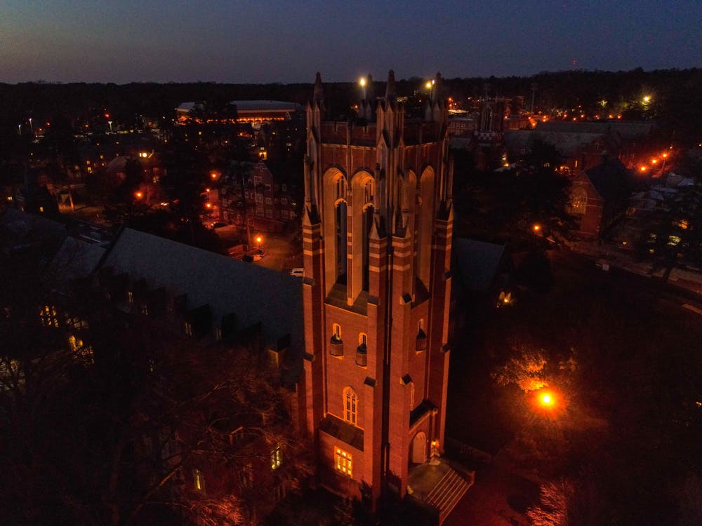 The tower at Boatwright Memorial Library glows on a March night.