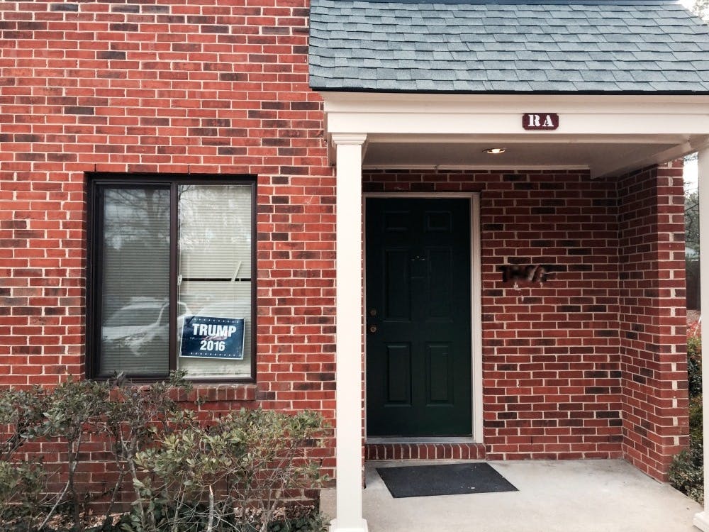 A Trump campaign sign sits in the window of a University Forest Apartment.&nbsp;