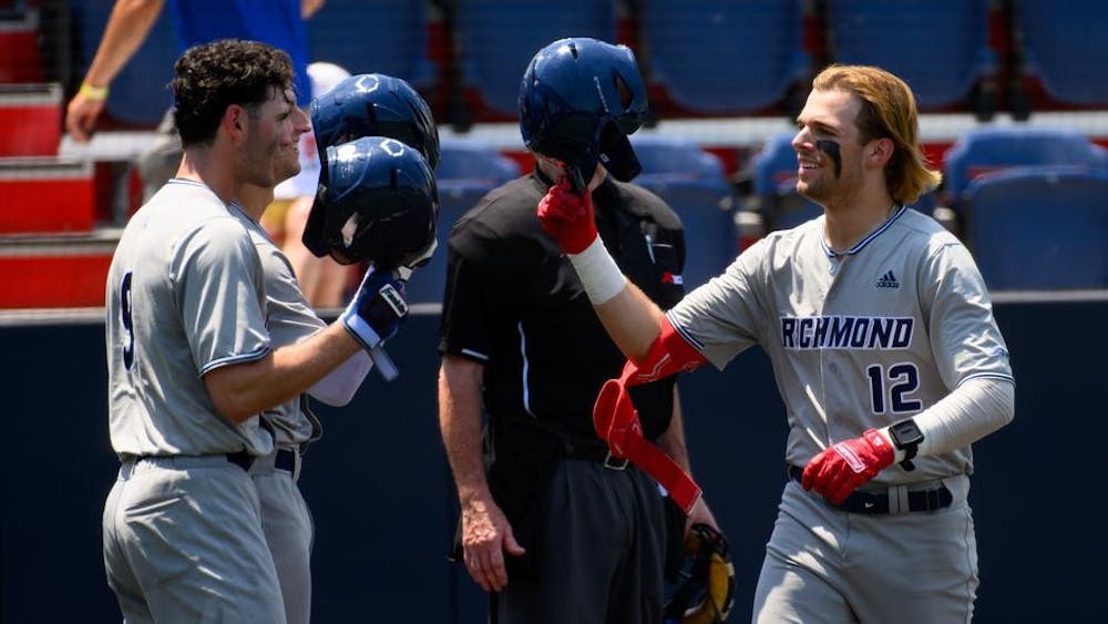 Freshman catcher Jack Arcamone and junior outfielder D.J. Pacheco during the May 22 game. Courtesy of Richmond Athletics.