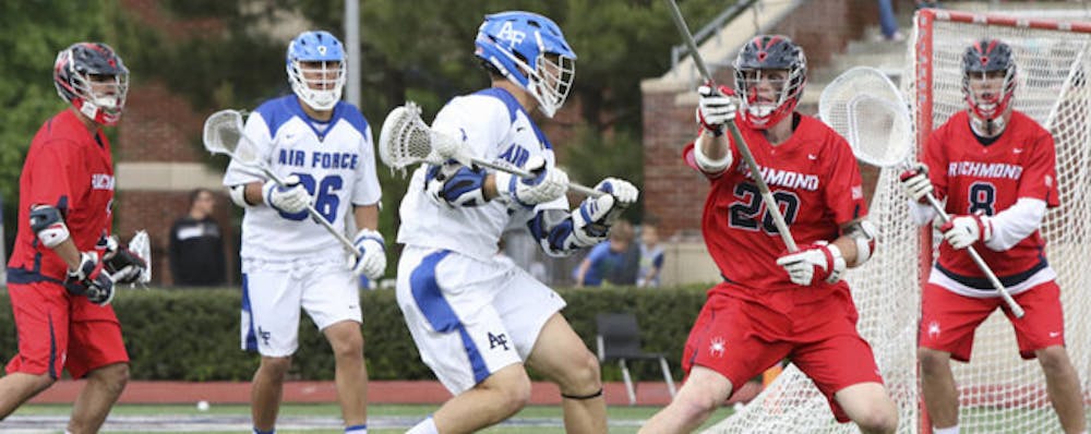 <p>Richmond players defending against Air Force's offense. Photo courtesy of Richmond Athletics.</p>