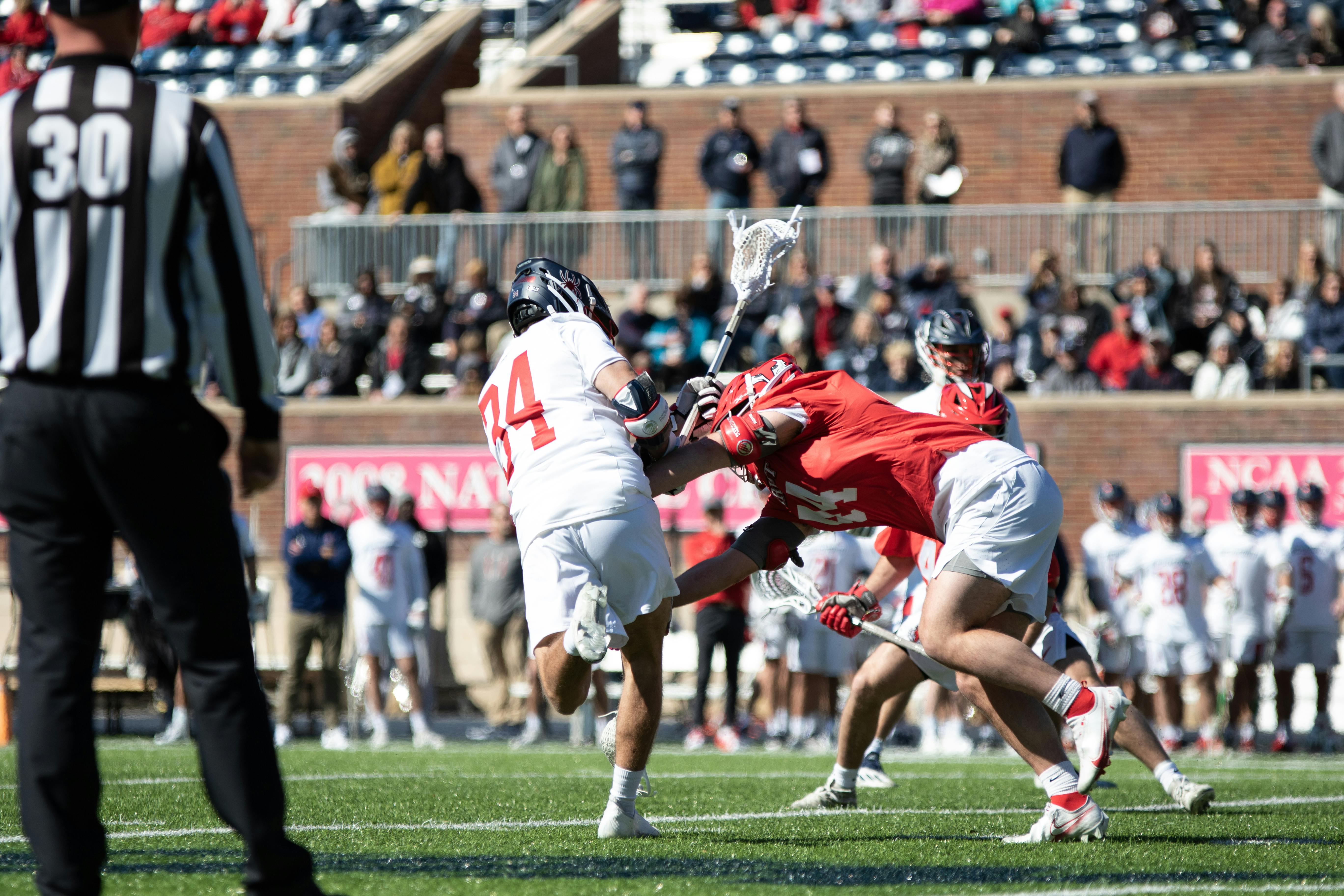 Sophomore midfielder JT Stirpe scores a goal against the defenders at the Feb.19 game against Marist College.