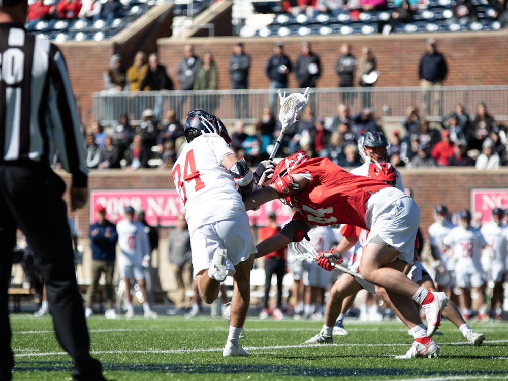 Sophomore midfielder JT Stirpe scores a goal against the defenders at the Feb.19 game against Marist College.