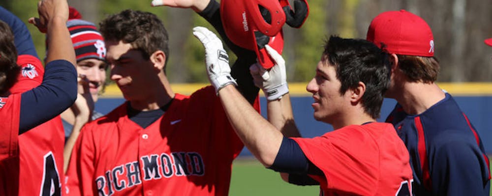 <p>The Richmond baseball team celebrates a win.&nbsp;</p>