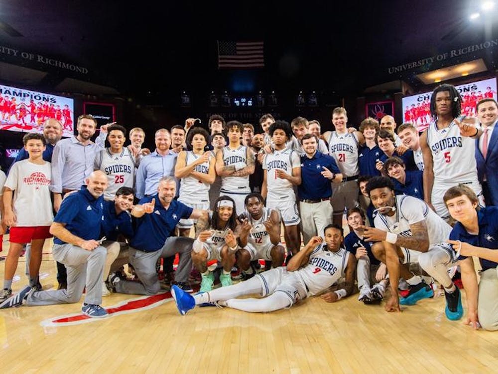 The Spiders celebrated their victory against Saint Joseph's University at the Robins Center on March 6. Courtesy of Richmond Athletics.