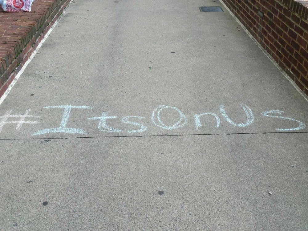 <p>Spiders Against Sexual Assault, a student group aimed at ending sexual assault on Richmond's campus, drew messages in chalk during Family Weekend.&nbsp;</p>