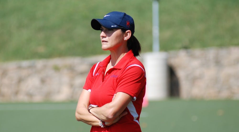 <p>Richmond field hockey coach Gina Lucido, who won her 100th career game during the 2015 season. Photo courtesy of Richmond Athletics.&nbsp;</p>